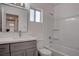 Bathroom featuring a vanity with a sink, toilet, and bathtub with shower at 613 W Victory Rd, Henderson, NV 89015