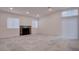 Bright living room with recessed lighting, fireplace, and sliding door access to outdoor space at 613 W Victory Rd, Henderson, NV 89015