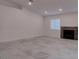 Bright living room with recessed lighting and fireplace at 613 W Victory Rd, Henderson, NV 89015