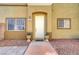 Welcoming home exterior featuring desert landscaping, walkway, and an inviting front entrance at 6320 Desert Leaf St # 101, North Las Vegas, NV 89081