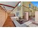 Private patio with awning, brick accents, and low-maintenance landscaping, perfect for outdoor living at 6320 Desert Leaf St # 101, North Las Vegas, NV 89081