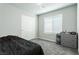 Bedroom featuring neutral walls and carpet with a comfortable twin bed at 7322 Glimmer Point St, North Las Vegas, NV 89084