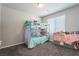 Bedroom featuring neutral walls and carpet with a bunk bed and storage at 7322 Glimmer Point St, North Las Vegas, NV 89084