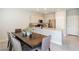 Dining room area featuring tile floors and easy access to kitchen at 7322 Glimmer Point St, North Las Vegas, NV 89084