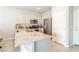 Well-lit kitchen featuring granite countertops and stainless steel appliances at 7322 Glimmer Point St, North Las Vegas, NV 89084