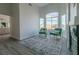 Stylish living room showcases a modern fireplace, high ceilings, and large bright windows at 9824 Gallo Dr, Las Vegas, NV 89147