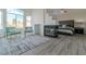 Modern main bedroom features a corner fireplace, high ceilings and a large window at 9824 Gallo Dr, Las Vegas, NV 89147