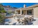 Backyard featuring a built-in firepit, outdoor seating, and a pool at 1 Grand Masters Dr, Las Vegas, NV 89141