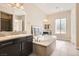 Bathroom featuring a large tub, dual vanities, and tile accents at 1 Grand Masters Dr, Las Vegas, NV 89141