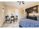 Bedroom featuring a glass dining table and a kitchenette area at 1 Grand Masters Dr, Las Vegas, NV 89141