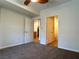 Bedroom with neutral carpet and two doors to the rest of the home at 10001 Peace Way # 2353, Las Vegas, NV 89147