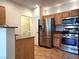 Well-equipped kitchen with stainless steel appliances and wood cabinets at 10001 Peace Way # 2353, Las Vegas, NV 89147