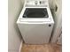 GE white top-load washing machine at 10001 Peace Way # 2353, Las Vegas, NV 89147