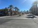 A residential street with Palm Trees at 10001 Peace Way # 2353, Las Vegas, NV 89147