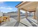 Covered patio and gravel backyard, perfect for outdoor entertaining and relaxation at 101 Deseo Ct, North Las Vegas, NV 89031