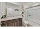 Well-appointed bathroom with granite countertops, updated fixtures, and a bathtub-shower combo for functionality at 101 Deseo Ct, North Las Vegas, NV 89031