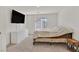 Well-lit bedroom with a minimalist design, complete with a modern dresser and comfortable bed at 101 Deseo Ct, North Las Vegas, NV 89031