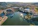 Breathtaking aerial view showcasing a waterfront community with beautiful architecture at 1150 Calcione Dr, Henderson, NV 89011