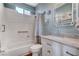 Well-lit bathroom with vanity and shower-tub combo at 1150 Calcione Dr, Henderson, NV 89011