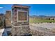 Stone Villa Palermo community sign featuring manicured landscaping and picturesque scenery at 1150 Calcione Dr, Henderson, NV 89011