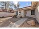 Inviting front entrance showcasing a well-manicured yard and charming curb appeal at 1709 Guthrie Dr, Las Vegas, NV 89117