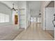 Spacious living room featuring carpet and tile flooring, neutral colors and open floor plan at 1709 Guthrie Dr, Las Vegas, NV 89117