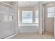 Bright main bathroom featuring a separate tub and shower at 1709 Guthrie Dr, Las Vegas, NV 89117