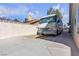 Spacious RV parking area adjacent to the house, offering convenient and secure storage at 1709 Guthrie Dr, Las Vegas, NV 89117