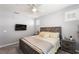 Comfortable bedroom with neutral walls, carpet, ceiling fan, TV, and modern furniture at 181 Sierra Alta Pl, Henderson, NV 89015