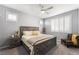 Comfortable bedroom with neutral walls, carpet, ceiling fan, and modern furniture at 181 Sierra Alta Pl, Henderson, NV 89015