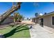 Spacious backyard featuring a combination of concrete patio and artificial grass at 2004 Burnham Ave, Las Vegas, NV 89104