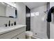 The bathroom showcases a modern vanity and tiled walk-in shower at 2004 Burnham Ave, Las Vegas, NV 89104