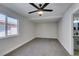 Bedroom with carpet flooring and modern ceiling fan at 2004 Burnham Ave, Las Vegas, NV 89104