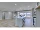 Modern kitchen featuring white cabinets, stainless steel appliances, and center island, offering both style and functionality at 2004 Burnham Ave, Las Vegas, NV 89104