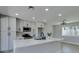 A bright kitchen with a center island, stainless steel appliances, and shaker style cabinets at 2004 Burnham Ave, Las Vegas, NV 89104