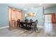 Elegant dining room with modern chandelier and stylish decor at 2421 Sunrise Springs Ct, North Las Vegas, NV 89031