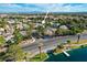 Aerial view of home at 2504 Cove Road surrounded by lush landscaping and a nearby lake at 2504 Cove Rd, Las Vegas, NV 89128