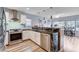 Kitchen with marble counters, stainless steel appliances and breakfast bar at 2504 Cove Rd, Las Vegas, NV 89128