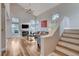 Bright living room with fireplace, wood floors and natural light at 2504 Cove Rd, Las Vegas, NV 89128