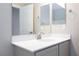 Bathroom features neutral paint, vanity and a large mirror at 26 Lilla Rosa St, Henderson, NV 89011