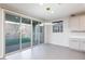 Dining area with sliding glass doors leading to a backyard area perfect for entertaining at 26 Lilla Rosa St, Henderson, NV 89011