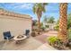 Backyard patio with fire pit, pergola and mature landscaping at 2638 Douglas Cir, Henderson, NV 89074