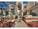 Inviting front entrance featuring decorative pillars, a tiled entryway, and a glass front door at 2638 Douglas Cir, Henderson, NV 89074