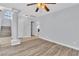 Comfortable living room with modern flooring, large windows and a view of the stairs at 2638 Douglas Cir, Henderson, NV 89074