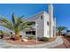 Condominium building with stucco exterior, red tile roof and desert landscaping at 2725 S Nellis Blvd # 2179, Las Vegas, NV 89121