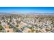 Picturesque aerial view of a residential community highlighting the city skyline at 306 Rodarte St, Henderson, NV 89014