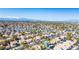 Picturesque aerial view of a residential community highlighting the city skyline at 306 Rodarte St, Henderson, NV 89014