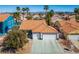 Inviting single-Gathering home with a tile roof, well-manicured lawn, and a spacious two-car garage at 306 Rodarte St, Henderson, NV 89014