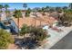 Well-maintained single-Gathering home featuring lush landscaping, tile roof, and a two-car garage at 306 Rodarte St, Henderson, NV 89014