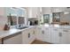 Bright kitchen with stainless steel appliances, white countertops, and modern backsplash at 306 Rodarte St, Henderson, NV 89014